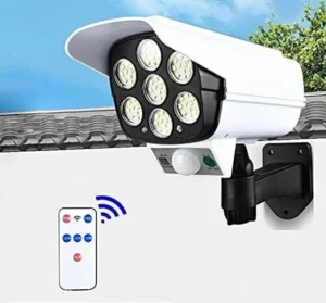 QXORE Solar Light Outdoor 77 Led Motion Sensor Security Camera Shaped Wall Lamp Solar Light Set (Wall Mounted Pack of 1)